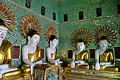 Myanmar - Sagaing, Umin Thounzeh (the 30 Caves), a colourful crescent-shaped colonnade within which there are 45 Buddha images. 